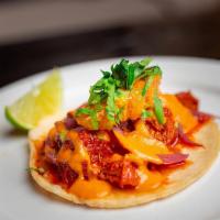 Cochinita · Yucatan style natural braised pork, habanero pickled onion, orange, chile de arbol sauce, ci...