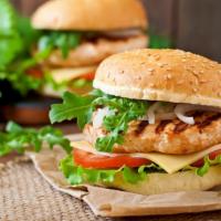 Chicken Shawarma Burger with Fries · Juicy marinated grilled chicken with house toppings and sauce.