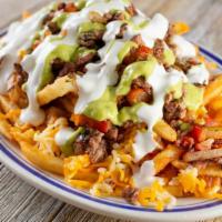 Beef Shawarma Fries · Delicious yummy juicy beef topped on crispy hand-cut fries.