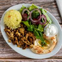 Chicken Shawerma Plate · Thin slice of marinated chicken, served with the works.