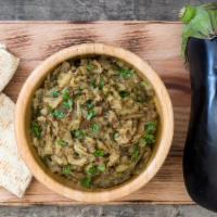 Baba Ganoush · Mashed cooked eggplant mixed with tahina, olive oil, and various seasonings.