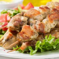 Chicken Kabob Salad · Lettuce, tomatoes. cucumbers, onions, olives and special dressing.