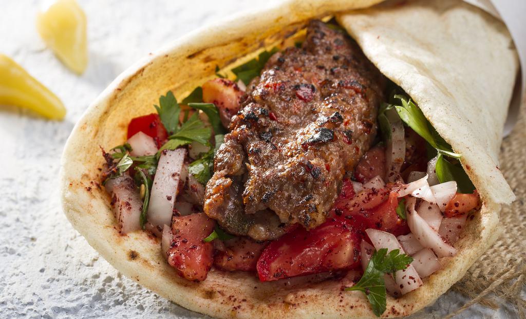Koobideh Wrap · One skewer ground beef, served with tomatoes, onions, lettuce. and Taziki
