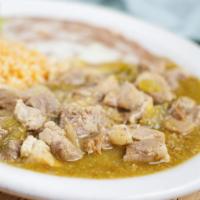 Chile Verde · Chunks of pork simmered in green tomatillo sauce. Served with rice and beans.