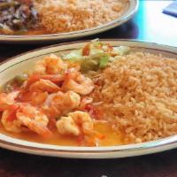 Camarones Rancheros · Shrimp prepared in our own sauce with sliced bell peppers, onion, tomatoes, and hot peppers....