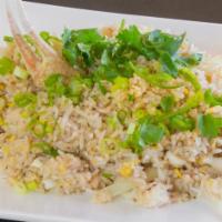 Fried Rice with Crab Meat · Stir fried rice, egg, real crab meat, yellow onion, green onion.