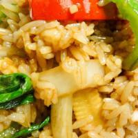 Basil Fried Rice · Stir fried rice, bell pepper, yellow onion, garlic sauce, baby corn, basil.