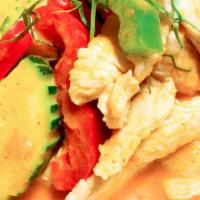 Panang Curry · Panang curry paste with coconut milk, zucchini, bell pepper, kaffir.