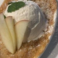 Red D'Anjou Pear Crisp · Pear, butter crumble topping, whipped cream.