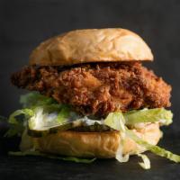 CLASSIC · Crispy chicken, house pickles, shredded lettuce, and herb mayo, on a grilled challah bun.