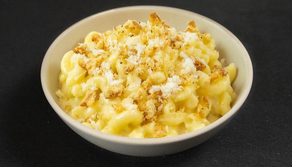 MAC N CHEESE · Topped with breadcrumbs.