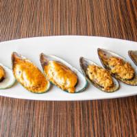 Baked Mussels · Spicy garlic or creamy sauce on baked baby mussels.