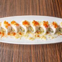 Crunchy Giants Roll · Spicy. Shrimp tempura roll topped with imitation snow crab, crunchy flakes, and tobiko.