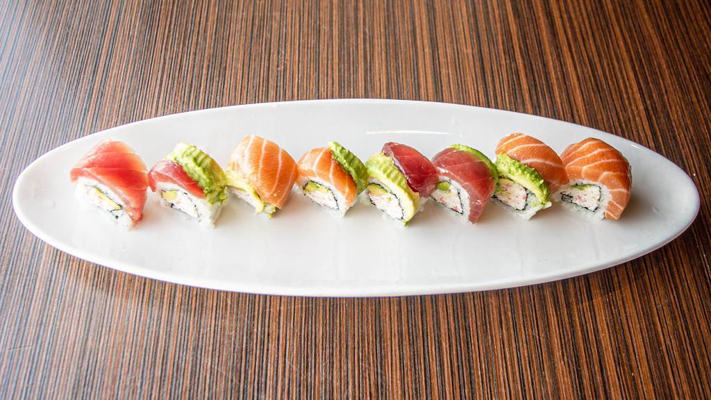 California King Roll · Imitation, snow crab meat, and avocado roll topped with salmon and tuna.