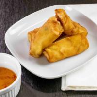 Crispy Spring Roll (4) · Crispy rolls filled with vegetables served with our signature plum sauce.