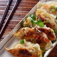 Pot Stickers (6) · Pick steamed or fried chicken and vegetable pot stickers paired with homemade sauce.