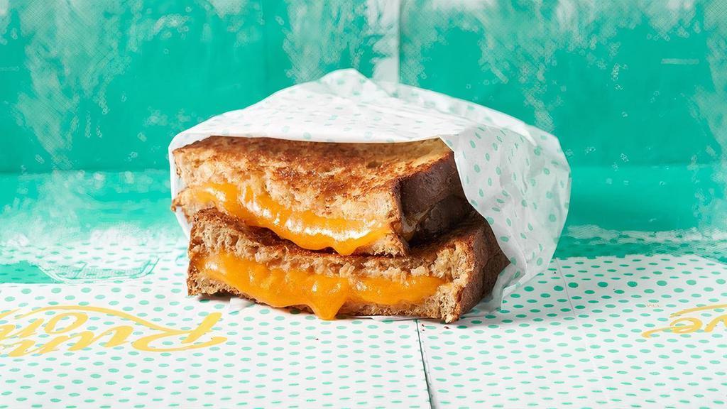 Grilled Cheese Sandwich · * Regular contains dairy & gluten . * Vegan contains gluten, soy & sunflower. * Gluten contains dairy . * Gluten Free Vegan contains soy & sunflower