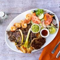 Mar y Tierra · Beef steak, shrimp, grilled chicken, chorizo, rice, beans, guacamole, fresh salad and grille...