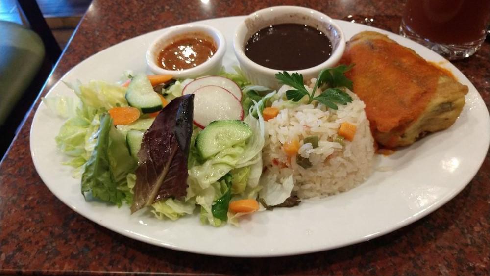 Chile Relleno · Beef, vegetable, rice, beans and fresh salad.