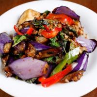 Pad Eggplant · Sautéed protein in black bean sauce with eggplant, bell pepper and basil.
