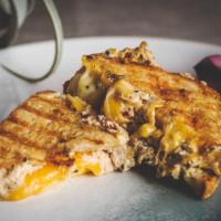 Tuna Melt Grilled Cheese · Gluten-free bread, organic cheddar cheese, organic pepper jack cheese, and spicy tuna. Serve...