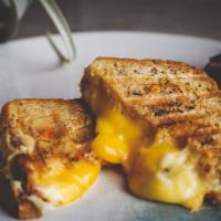 OG Grilled Cheese · Gluten-free bread, mayo, organic cheddar cheese, and organic pepper jack cheese. Served with...