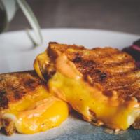 Spicy Grilled Cheese · Gluten-free bread, spicy mayo, organic cheddar cheese, and organic pepper jack cheese. Serve...