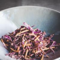 Spicy Coleslaw · Shredded purple cabbage and rainbow carrots with a spicy mayo dressing