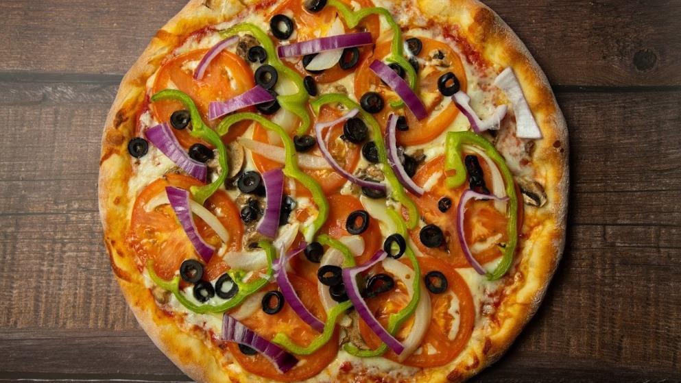Vegetarian Special · Fresh tomatoes, bell peppers, red onions, black olives & mushrooms.