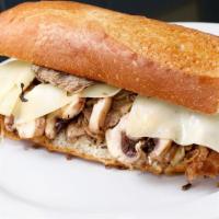 Mushroom Philly Cheese Steak Sandwich · Beef or chicken, grilled onions, mushrooms, and choice of cheese.