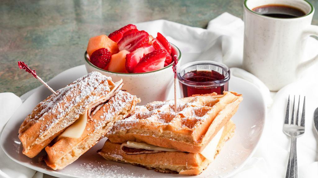 Cristo Wich · Country Waffles (North Cedar Avenue) favorite: Turkey, ham, swiss cheese topped with powdered sugar.