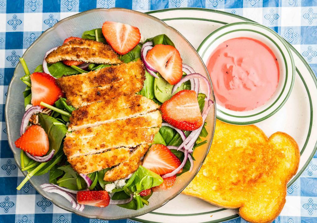 Strawberry Spinach Salad · Country Waffles (North Cedar Avenue) favorite: Grilled chicken, chopped pecans, strawberries, bleu cheese crumbles, avocado, red onion and spinach. With raspberry vinaigrette dressing.