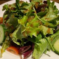 House Salad · Organic mixed greens with your choice of onion soy dressing , miso dressing, or ginger dress...