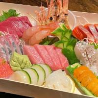 Chirashi · Assorted sliced fish over sushi rice. (Assortment of fish may vary on the day.)
