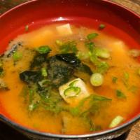 Miso Soup · Traditional style miso soup crafted from our dashi and softened miso paste.