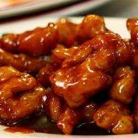 *General Tso's Orange Chicken (左鸡) · Crispy chicken nuggets wok-tossed in a tangy, sweet, and spicy orange sauce. Mildly spicy. A...