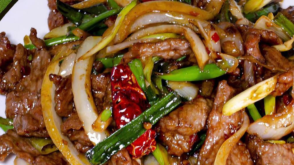 *Wok-Seared Mongolian (蒙古肉) · Tender flank steak beef wok-seared with grilled onion, garlic, dried chili, jalapeño and scallion. Spicy. Alternative protein ( chicken/pork/prawn) available.