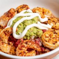 GRILLED SHRIMP BURRITO BOWL * · A burrito bowl served with our grilled shrimp, rice, pinto beans, guacamole, pico de gallo, ...