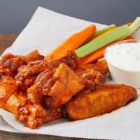 CHICKEN WINGS * · Chicken wings with your choice of sauce, served with carrots, celery, & blue cheese dressing