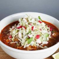 POZOLE * · Pork and hominy stew in a savory broth with guajillo and ancho chiles. Served with cabbage, ...