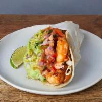 CRISPY SHRIMP TACO * · Marinated shrimp in a crispy tortilla wrapped in a soft tortilla. With Jack cheese, guacamol...