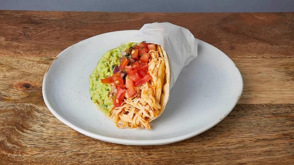 CRISPY POLLO * · One taco with a grilled crispy corn tortilla wrapped in a soft corn tortilla. With Jack cheese, pinto beans, pico de gallo, & guacamole
