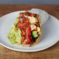 CRISPY GRILLED VEGGIE * · One taco with a grilled crispy corn tortilla wrapped in a soft corn tortilla. With seasonal ...