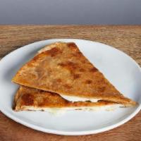 KID QUESADILLA * · Crispy wheat tortilla with Jack cheese