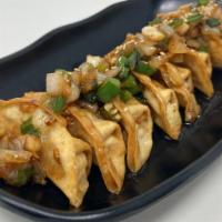 Deluxe Fried Dumplings · Fried dumplings, drizzled with house-made sweet/savory sauce.
8 pieces.