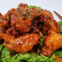 Spicy Fried Wings · Spicy. deep-fried wing glazed with spicy sauce.