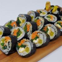 Kimbap · Recommended. Two rice rolls. Yellow radish, carrot, spinach, fishcake, and egg.
