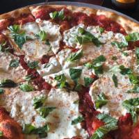 Margherita · 18 inch pizza with basil and fresh mozzarella.
