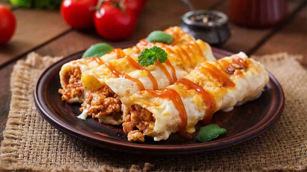 Enchilada · Specialty Enchilada customized to customer's preference.