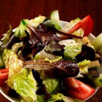 Mixed Green Salad · Organic spring mix, romaine, tomato, cucumber, and vinaigrette.